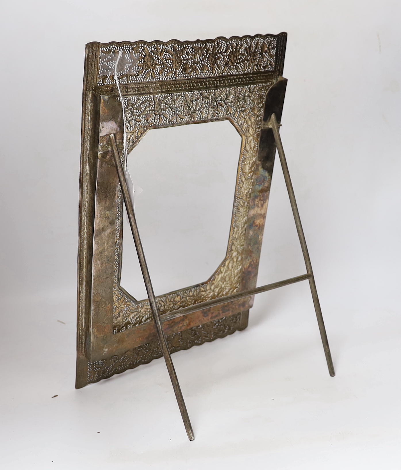 An Indian metal photo easel frame, 37 x 25cm total